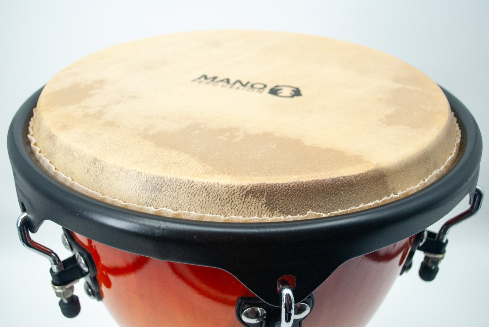 Mano Percussion 12" Djembe with Comfort Rim and Natural Skin Head, Sunburst by Coast Music