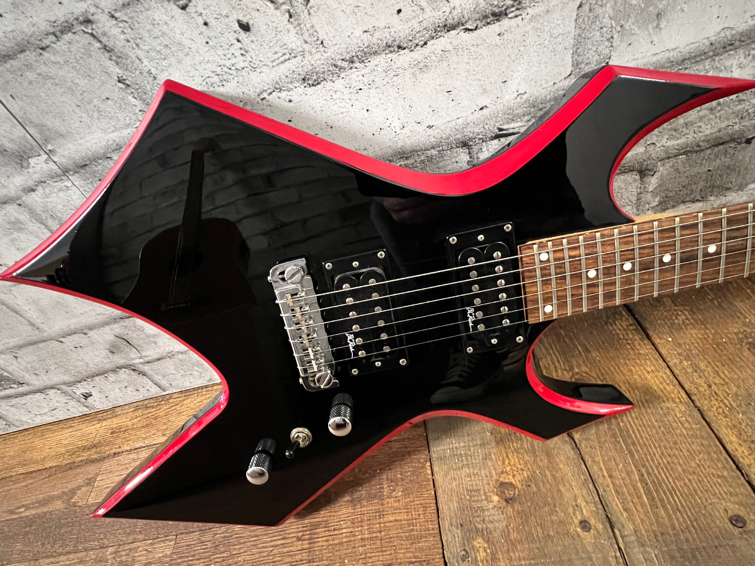 Used B.C. Rich Warlock w/ Red Bevels