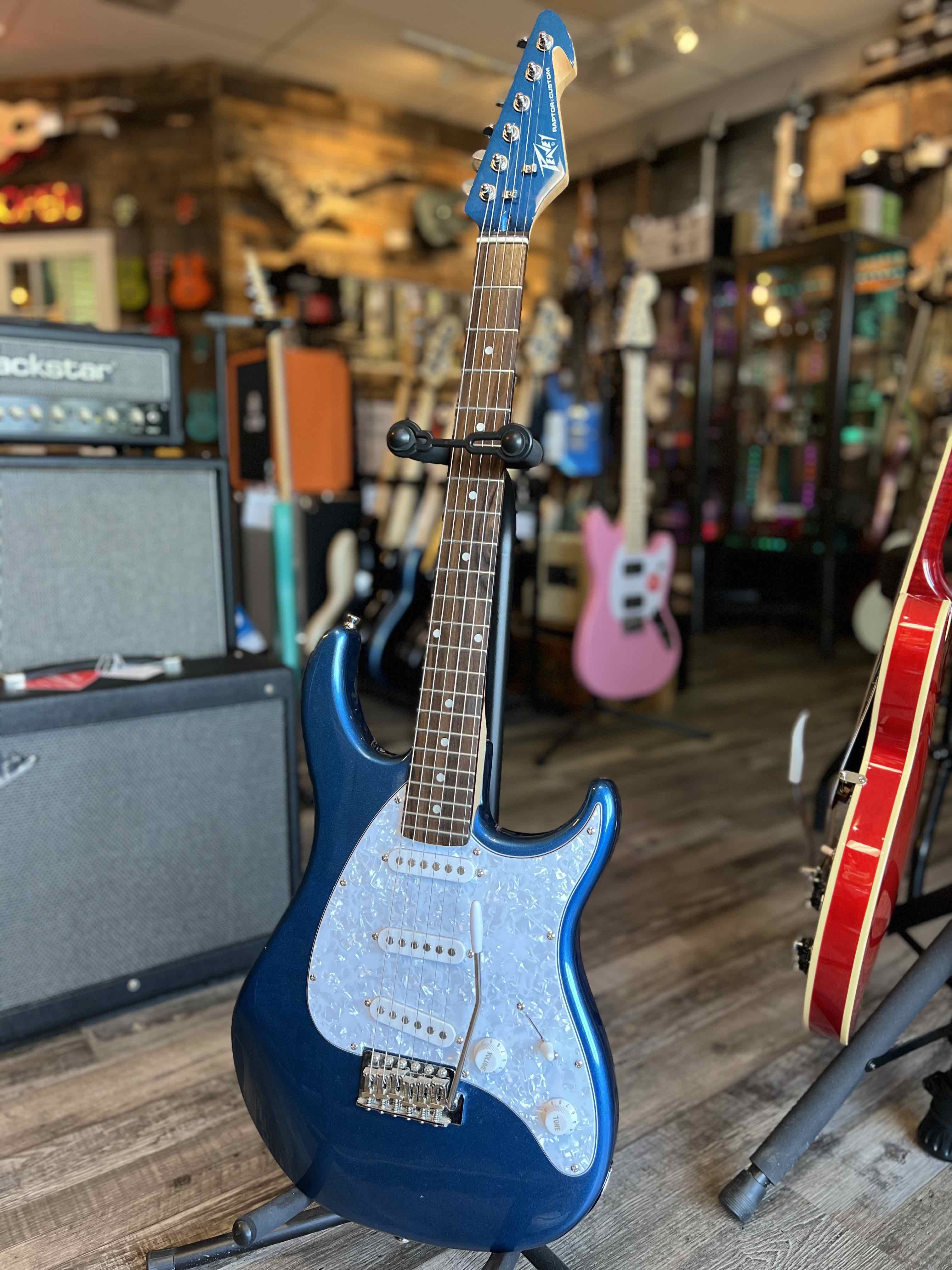 Used Peavey Raptor Custom - Blue w/ matching headstock